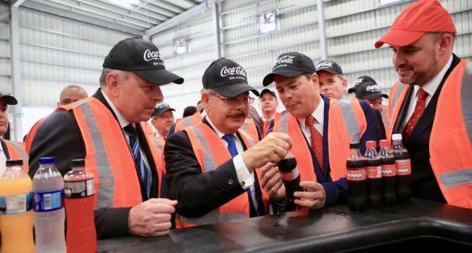 Danilo Medina asiste a puesta en marcha nueva línea de producción de bebidas de Bepensa Dominicana